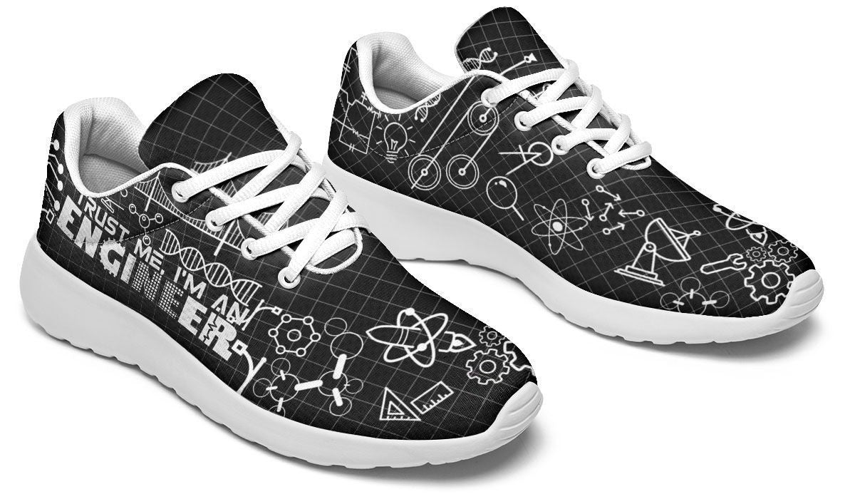 Sneakers ingé noires lacets blancs motif engrenages plans techniques, paire vue dessus