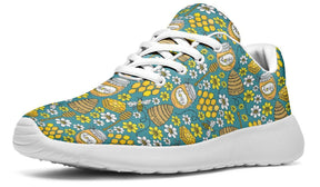 Basket basse abeille bleu turquoise vue côté motif imprimé all-over lacets blancs semelle