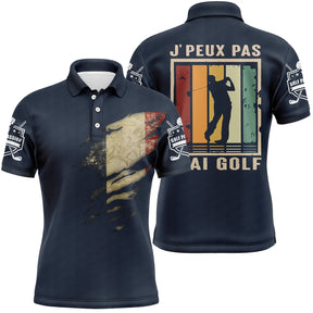 Polo golf bleu marine avec slogan J'peux pas j'ai golf et golfeur en plein swing au coucher de soleil
