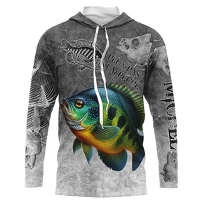 T-shirt anti UV à capuche pêche crapet humour, fond gris ardoise avec sunfish coloré et hameçons stylisés, prénom brodé