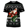Pull Noël noir avec Père Noël pêcheur sur boîte cadeau et gros poisson au crochet, motifs jacquard cannes à pêche