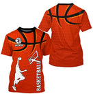 T-shirt basketball orange éclatant avec silhouette joueur dunk et ballon stylisé central