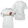 T-shirt golf vintage blanc avec design golfeur silhouette soleil orange dégradé et inscription GOLF