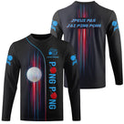 T-shirt tennis de table homme col rond noir avec rayons rouges bleus et slogan ping pong