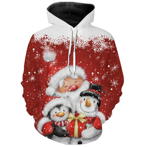 Sweat à capuche Noël rouge unisexe avec Père Noël, bonhomme de neige et pingouin sous flocons