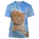 T-shirt chat 3D bleu ciel avec chaton roux dans un hamac de tissu blanc, all-over photoréaliste