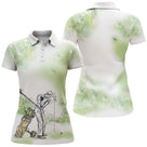 Polo de golf femme vert nature aquarelle silhouette golfeuse et sac de clubs coupe ajustée féminine