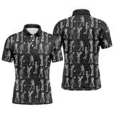 Polo de golf homme noir avec silhouettes de golfeurs blanches en swing all-over coupe ajustée