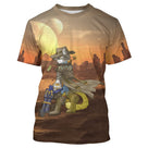 T-shirt chat cowboy brun orange avec chat shérif chapeauté monté sur canon dans paysage western au crépuscule