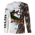 T-shirt manches longues pêche brochet, silhouette esox en action et écailles brunes, prénom brodé manche
