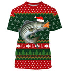 Pull Noël vert rouge avec bar loup de mer coiffé bonnet Père Noël et hameçons jacquard, motifs sapins