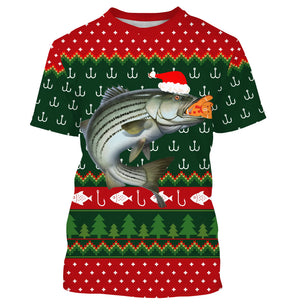 Pull Noël vert rouge avec bar loup de mer coiffé bonnet Père Noël et hameçons jacquard, motifs sapins