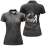 Polo golf femme premium noir effet fumée blanche silhouette golfeur swing clubs croisés coupe cintrée tissu respirant
