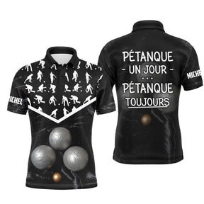 Polo pétanque personnalisé noir marbré avec silhouettes boulistes et lettrage Pétanque Un Jour Toujours, prénom imprimé