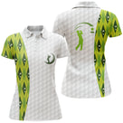Polo golf femme blanc losanges vert prairie épaule silhouette golfeur swing coupe cintrée tissu respirant