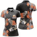 Polo billard noir et orange femme avec motif argyle et squelette tenant queue de billard, prénom personnalisé